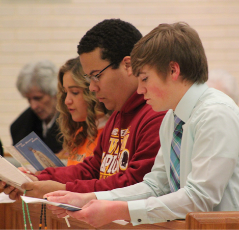 Holy Cross High School students lead the rosary for life in our chapel.